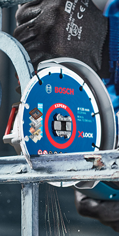 A Bosch Expert XLOCK saw blade is mounted on a machine.